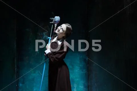 Portrait of a young girl in school uniform as a vampire woman Stock Photos