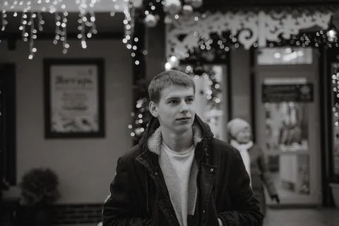 Portrait of a young guy in a winter jacket Stock Photos