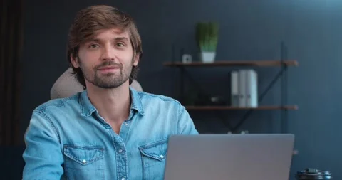 Portrait of young Handsome Freelancer or Student is working studying from Home Stock Footage 145773643
