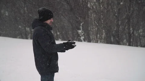 Portrait of a young handsome man with a beard. A bearded man in the winter woods Stock Footage 72734819