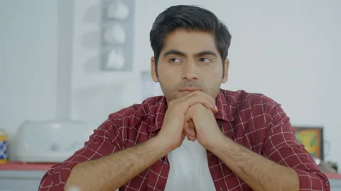 Portrait of a young husband thinking about his life problems alone at home Stock Footage 144600481
