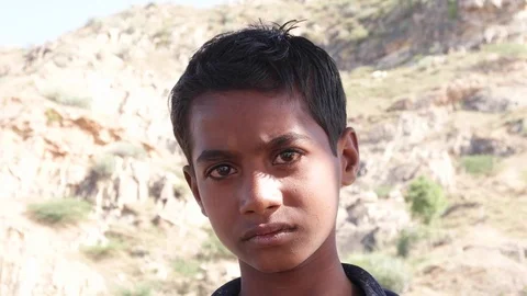 Portrait of a young Indian boy getting frightened and scared  Stock Footage 70411311