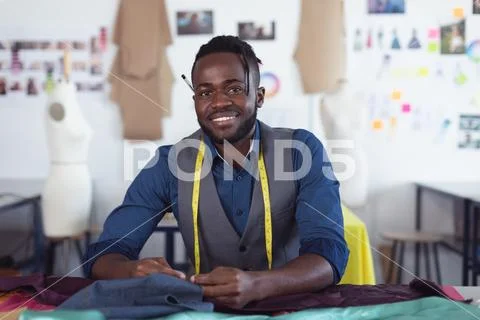 Portrait of a young male fashion student at college Stock Photos