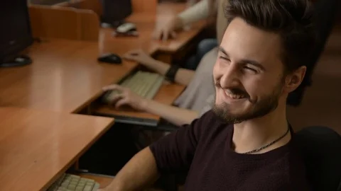 Portrait of a young man with a beard smiling Stock Footage