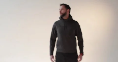 Portrait of a young man with a beard in the studio. Stock Footage 253392484