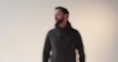 Portrait of a young man with a beard in the studio. Stock Footage 253393294