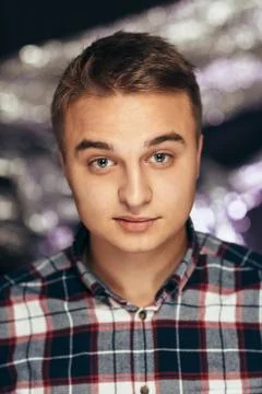 Portrait of a young man on a blurred background Stock Photos