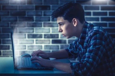 Portrait of a young man with a computer. A virtual reality Stock Photos