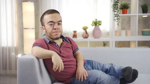 Portrait of a young man with dwarfism. Stock Footage 230966432