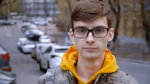 Portrait of a young man with glasses 库存影片 106105372