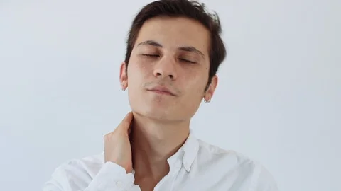 Portrait of Young Man Having Neck Pain, Feeling Exhausted 動画素材 92741097