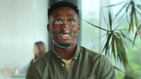 Portrait of young man looking at camera and hi-tech detection face. Data Stock Footage 197356172