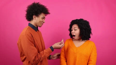 Portrait of young man making a proposal to his girlfriend Stock Footage 230302283