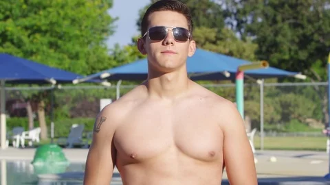 Portrait of young man at the pool Stock-Footage 80134227