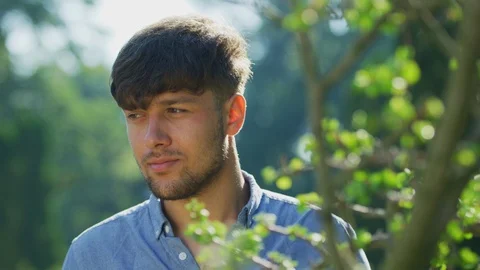 Portrait of a young man smiling Stock Footage 99964034