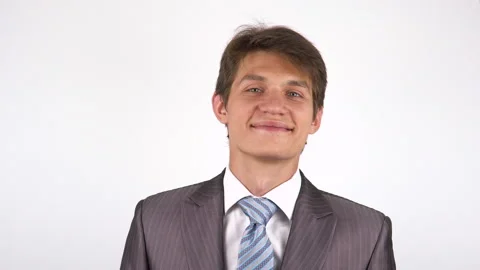 Portrait of a young man. Smiling looking at the camera. Stock Footage 92530502