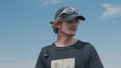 Portrait of the young man talking during outdoor interview Stock Footage 330534584