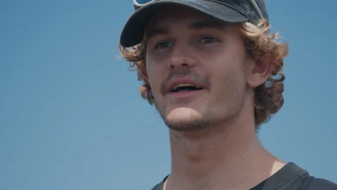 Portrait of the young man talking during outdoor interview Stock Footage 330534872