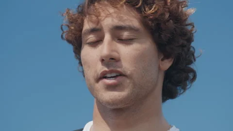 Portrait of the young man talking during outdoor interview Stock Footage 330535078