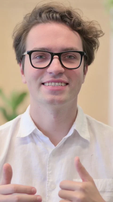Portrait of Young Man Talking on Online Video Call, Vertical Video Stock Footage 340033809