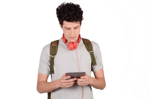 Portrait of young man using tablet. Stock Photos