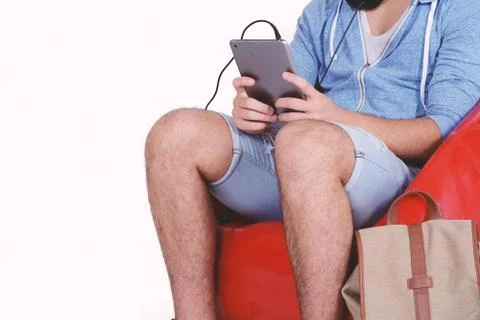 Portrait of young man using tablet. Stock Photos