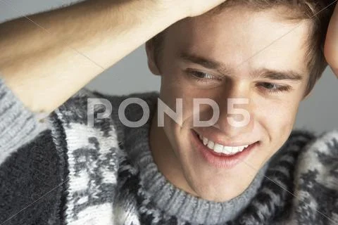 Portrait Of Young Man Wearing Jumper Stock Photos