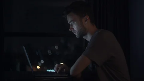 Portrait of Young Man Working Overtime In The Office or Remote Workplace. 4K Stock Footage 120366636