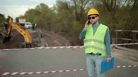 Portrait of young man working speaking by phone. Male architect, mobile phone Stock-Footage 199648179