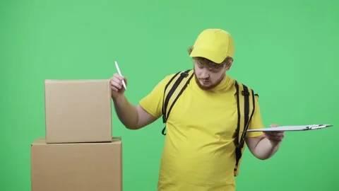 Portrait of young men checking number of parcels and happy with the result Stock Footage 155972286