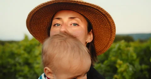 Portrait of Young Mom gently hugging her cute little baby boy in French Provence 스톡 동영상 203840171
