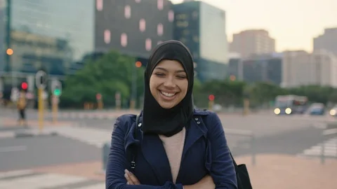Portrait of young muslim business woman executive laughing cheerful at camera on Stock Footage