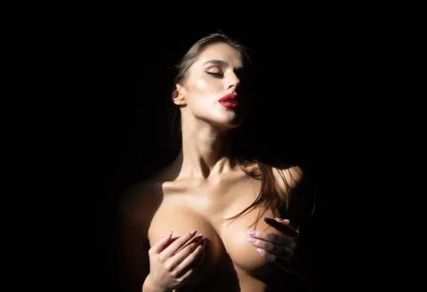 Portrait of young naked attractive woman. Sexy lips and tits boobs, breast Stock Photos