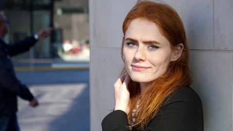 Portrait of young red haired buiness woman in smart blazer Video stock 78367269