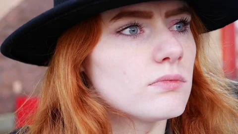Portrait of young red haired lady close up Stock Footage 78250775