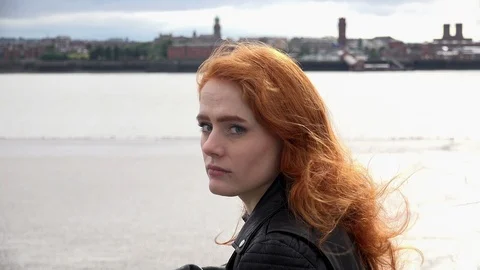 Portrait of young red head Turning to Look At Camera Stock Footage 90289853