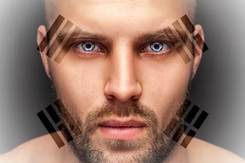 Portrait of a young serious man, in whose eyes the reflected national flag of Stock Photos