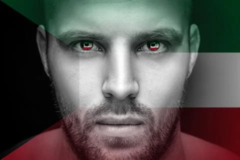 Portrait of a young serious man, in whose eyes the reflected national flag of Stock Photos