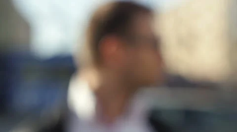 Portrait of young stylish man standing in the city street. 動画素材 48364009