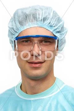 Portrait of a young surgeon in goggles Stock Photos