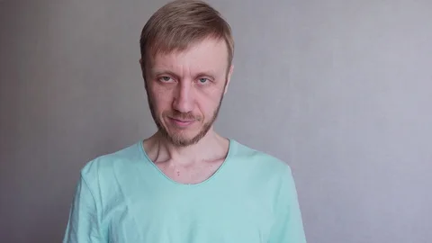 Portrait of a young white man with a beard Stock Footage 128179814