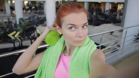The portrait of young woman doing selfie on training in the modern gym. Stock Footage 83411253