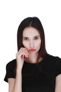 Portrait of a young woman over white background Stock-Fotos