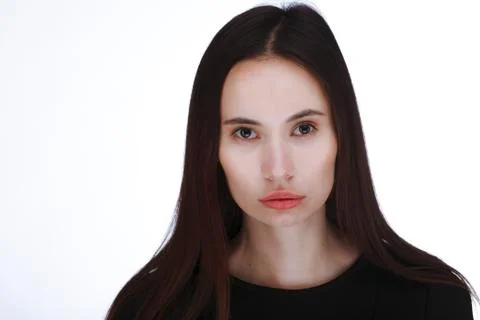 Portrait of a young woman over white background Stock Photos