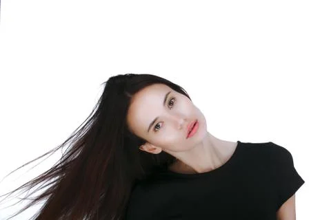 Portrait of a young woman over white background Stock Photos
