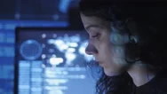 Portrait Of Young Woman Programmer Working At A Computer In The Data Center Stock Footage