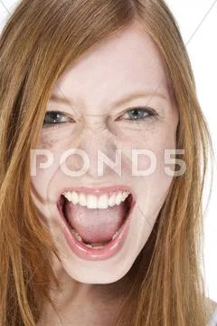 Portrait of young woman shouting, close up Stock Photos