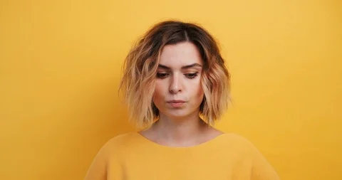 Portrait young woman thinks, finding solution Idea pointing forward index finger Stock Footage 120304591