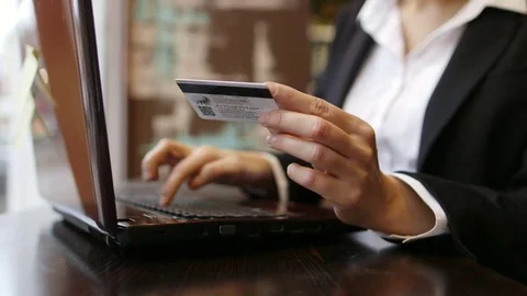 Portrait of Young Woman Using Smart Phone in a Cafe by the Window. Vídeo Stock 82875557