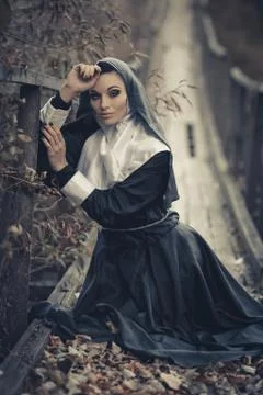 The portrait of young,snorting,stunning,beautiful,attractive nun Stock Photos